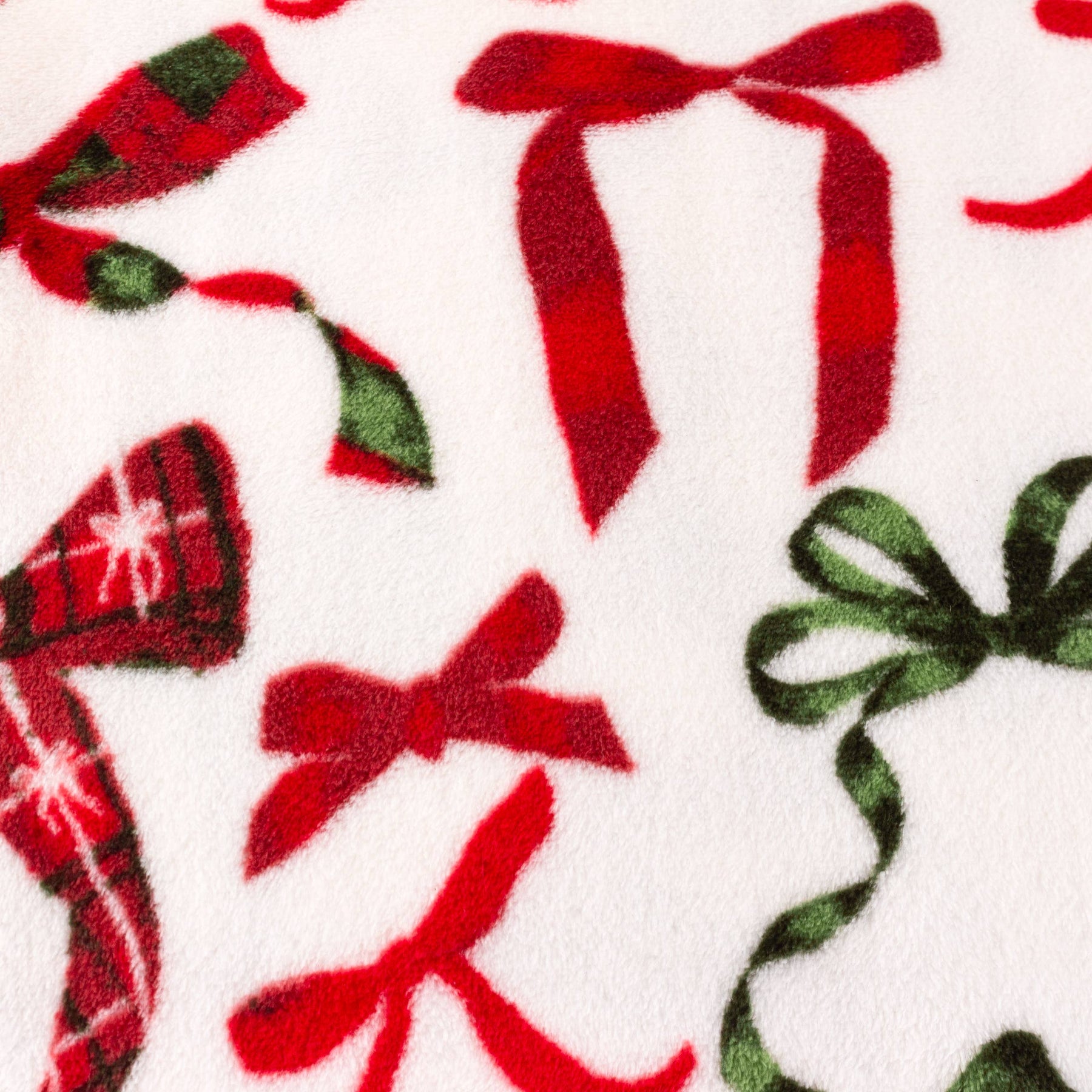 Nathalie Festive Bows Printed Fleece Throw Berry/Pine